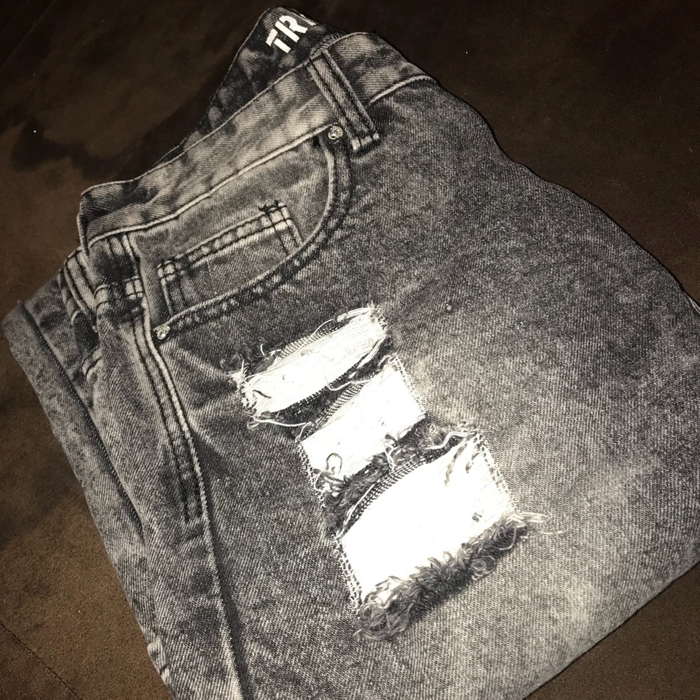 Ripped dark denim jeans